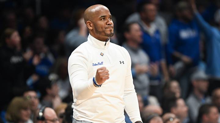 Seton Hall Pirates head coach Shaheen Holloway celebrates after winning the NIT Seton Hall Pirates head coach Shaheen Holloway celebrates after winning the NIT