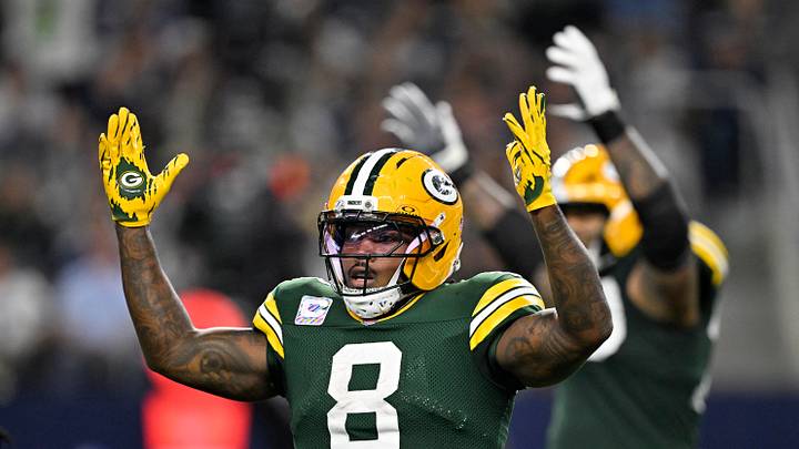 Green Bay Packers running back Josh Jacobs (8) celebrates after a touchdown