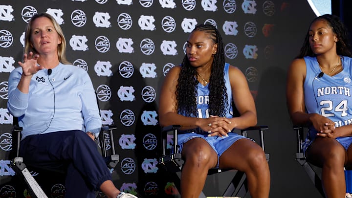 North Carolina head coach Courtney Banghart, junior guard Reniya Kelly and senior guard Indya Nivar 