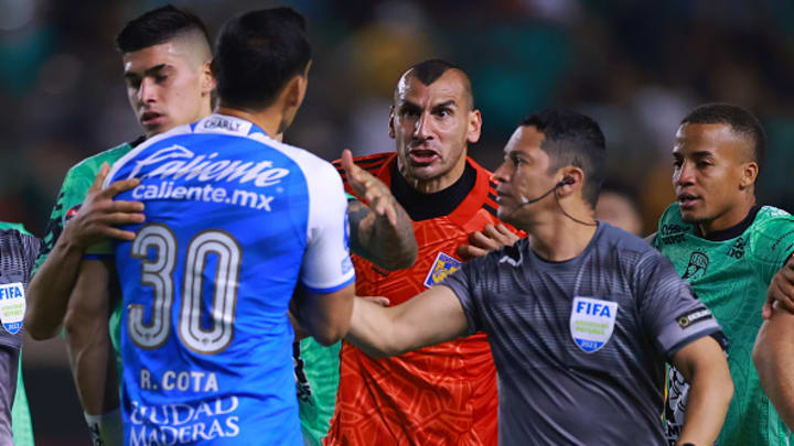 Nahuel Guzmán y Rodolfo Cota.