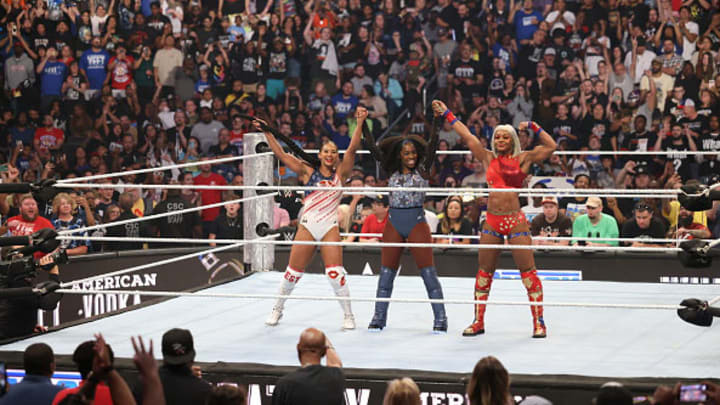 Bianca Belair, Naomi and Jade Cargill celebrate after their win during SmackDown at Capital One Arena. Bianca Belair, Naomi and Jade Cargill celebrate after their win during SmackDown at Capital One Arena.
