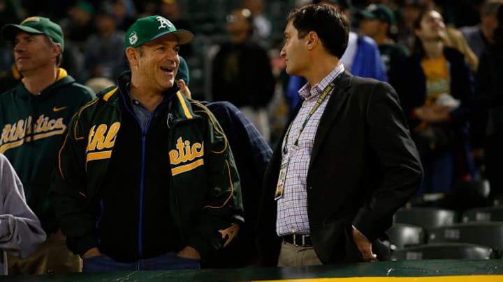 Fisher and A's president Dave Kaval pictured at the Oakland Coliseum in 2017.