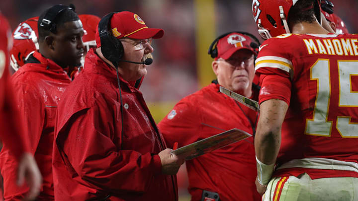 Kansas City Chiefs coach Andy Reid speaks to Patrick Mahomes during overtime of a game against the Tampa Bay Buccaneers at GEHA Field at Arrowhead Stadium on November 04, 2024 in Kansas City, Missouri.