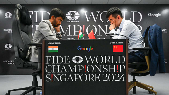 Gukesh Dommaraju and Ding Liren at the FIDE World Chess Championship on Nov. 25, 2024.