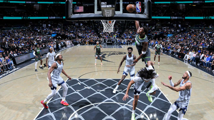 Anthony Edwards dunks on Anthony Black during the Timberwolves - Magic game.
