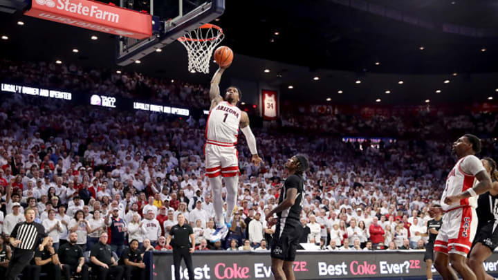 Arizona Wildcats G Caleb Love dunks against Iowa State