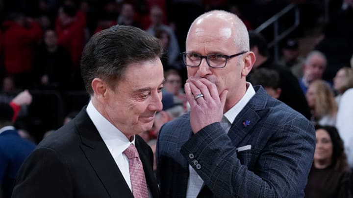 Pitino and UConn coach Dan Hurley speak before a game. Pitino and UConn coach Dan Hurley speak before a game.