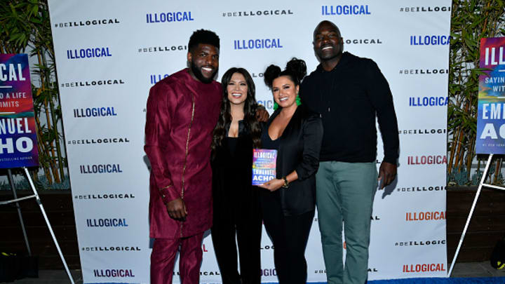 Emmanuel Acho, Alex Curry, Joy Taylor and Marcellus Wiley (left to right) pose while promoting Acho's book.