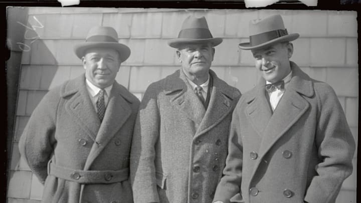 Knute Rockne (left) poses with fellow Hall of Famers Pop Warner (center) of Stanford and Tad Jones of Yale in an undated photograph.