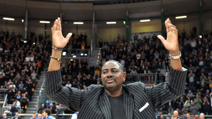 Michael Ray Richardson waves to the crowd at a 2019 Italian league game.