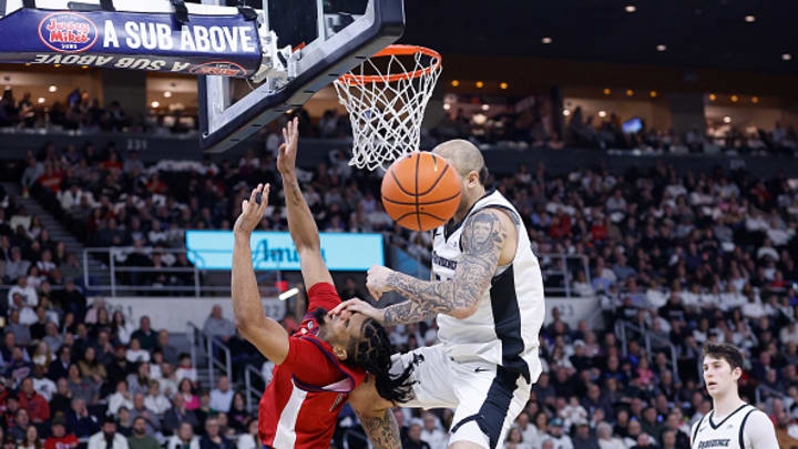 Powell (right) was assessed a flagrant 2 for this foul on Hopkins (left) under the basket. Powell (right) was assessed a flagrant 2 for this foul on Hopkins (left) under the basket.