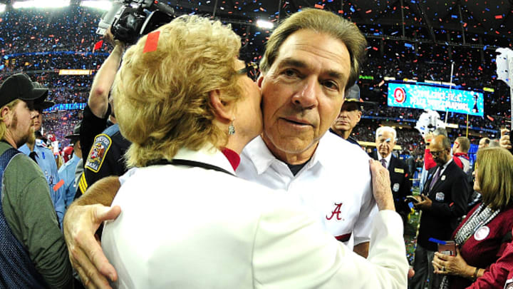Nick Saban and his mother, Mary, celebrate Alabama’s Peach Bowl win over Washington in 2016.