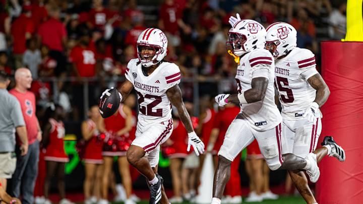 Jahmad Harmon of the UMass Minutemen celebrates an interception. Jahmad Harmon of the UMass Minutemen celebrates an interception.