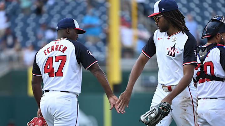 Sep 15, 2024; Washington, District of Columbia, USA; Washington Nationals relief pitcher Jose Ferrer (47) and left fielder James Wood (29) celebrate after defeating the Miami Marlins at Nationals Park. Sep 15, 2024; Washington, District of Columbia, USA; Washington Nationals relief pitcher Jose Ferrer (47) and left fielder James Wood (29) celebrate after defeating the Miami Marlins at Nationals Park.