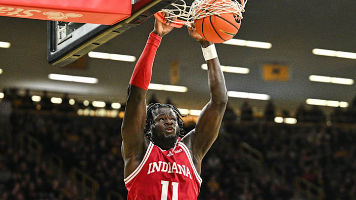 Jan 11, 2025; Iowa City, Iowa, USA; Indiana Hoosiers center Oumar Ballo (11)  dunks against the Iowa Hawkeyes during the first half at Carver-Hawkeye Arena. Mandatory Credit: Jeffrey Becker-Imagn Images