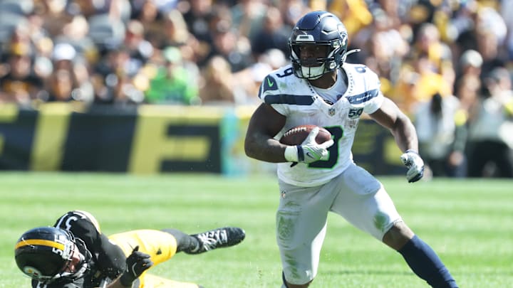 Sep 14, 2025; Pittsburgh, Pennsylvania, USA; Seattle Seahawks running back Kenneth Walker III (9) runs the ball past Pittsburgh Steelers linebacker Nick Herbig (51) during the fourth quarter at Acrisure Stadium. Mandatory Credit: Charles LeClaire-Imagn Images Sep 14, 2025; Pittsburgh, Pennsylvania, USA; Seattle Seahawks running back Kenneth Walker III (9) runs the ball past Pittsburgh Steelers linebacker Nick Herbig (51) during the fourth quarter at Acrisure Stadium. Mandatory Credit: Charles LeClaire-Imagn Images
