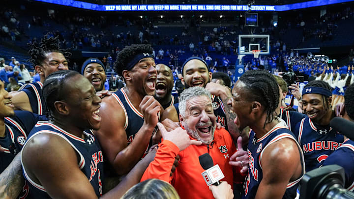 Auburn head coach Bruce Pearl and his No.1 Tigers celebrate after their 94-78 win over Kentucky -- the first win at Rupp Arena since 1988 -- in SEC basketball Saturday afternoon in Lexington, Kentucky March 1, 2025