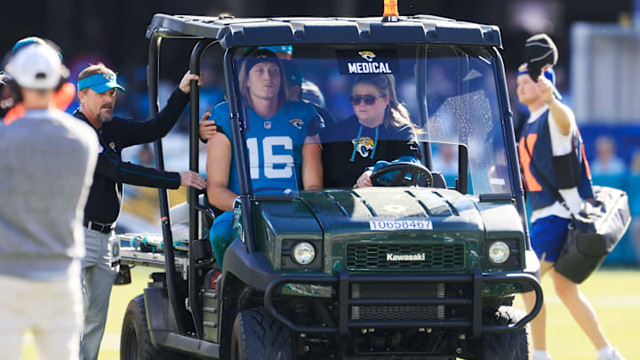 Jacksonville Jaguars quarterback Trevor Lawrence (16) is carted off the field after sustaining a heavy hit during the second quarter of an NFL football matchup Sunday, Dec. 1, 2024 at EverBank Stadium in Jacksonville, Fla. [Corey Perrine/Florida Times-Union]