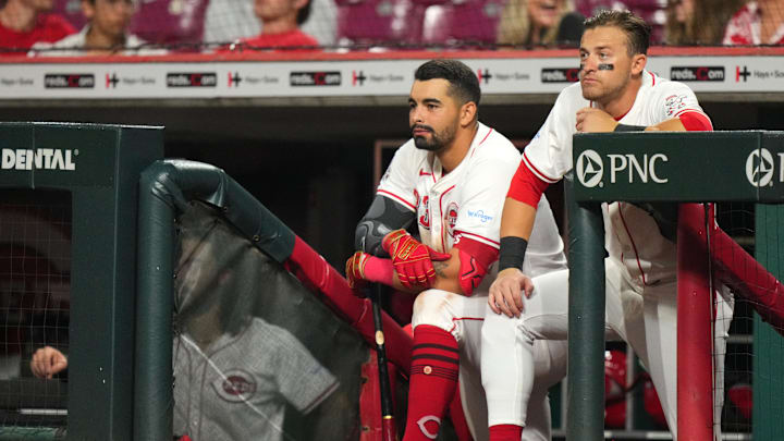 Cincinnati Reds first base Christian Encarnacion-Strand (33) and Cincinnati Reds outfielder TJ Friedl (29) stand at the top of the dugout steps in the ninth inning of a baseball game between the Arizona Diamondbacks and Cincinnati Reds, Tuesday, May 7, 2024, at Great American Ball Park in Cincinnati.
