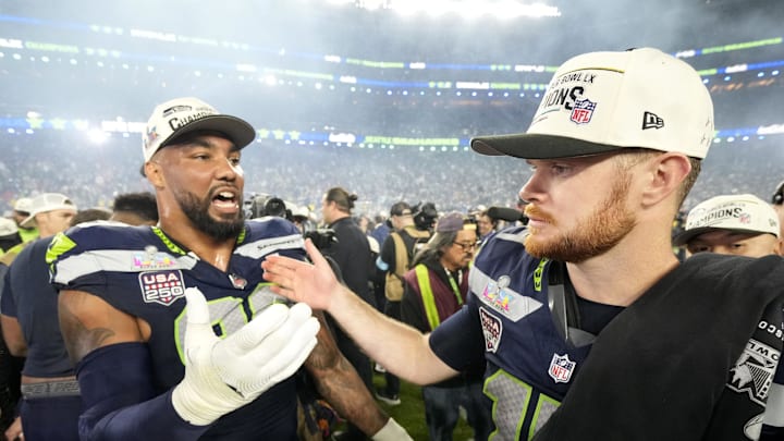 Feb 8, 2026; Santa Clara, CA, USA; Seattle Seahawks quarterback Sam Darnold (14) celebrates with defensive end Leonard Williams (99) after defeating the New England Patriots in Super Bowl LX at Levi's Stadium. Mandatory Credit: Kyle Terada-Imagn Images