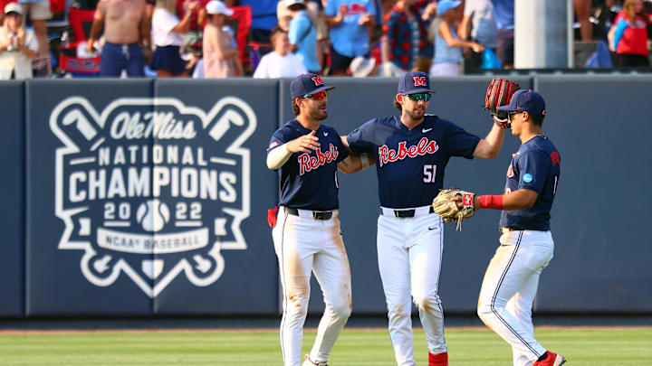 Jun 1, 2025; Oxford, MS, USA; Mississippi Rebels outfielders Mitchell Sanford (4), Isaac Humphrey (51) and Hayden Federico (9) react after defeating the Georgia Tech Yellowjackets. Mandatory Credit: Petre Thomas-Imagn Images