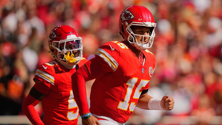 Oct 19, 2025; Kansas City, Missouri, USA; Kansas City Chiefs quarterback Patrick Mahomes (15) and wide receiver Marquise Brown (5) head to the bench after scoring a touchdown against the Las Vegas Raiders during the second quarter of the game at GEHA Field at Arrowhead Stadium. Mandatory Credit: Jay Biggerstaff-Imagn Images Oct 19, 2025; Kansas City, Missouri, USA; Kansas City Chiefs quarterback Patrick Mahomes (15) and wide receiver Marquise Brown (5) head to the bench after scoring a touchdown against the Las Vegas Raiders during the second quarter of the game at GEHA Field at Arrowhead Stadium. Mandatory Credit: Jay Biggerstaff-Imagn Images