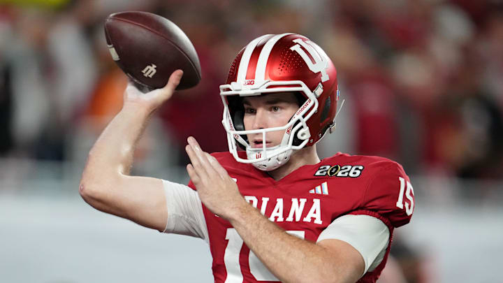 Jan 19, 2026; Miami Gardens, FL, USA; Indiana Hoosiers quarterback Fernando Mendoza (15) warms up before the CFP National Championship college football game between the Indiana Hoosiers and the Miami Hurricanes at Hard Rock Stadium. Mandatory Credit: Kirby Lee-Imagn Images