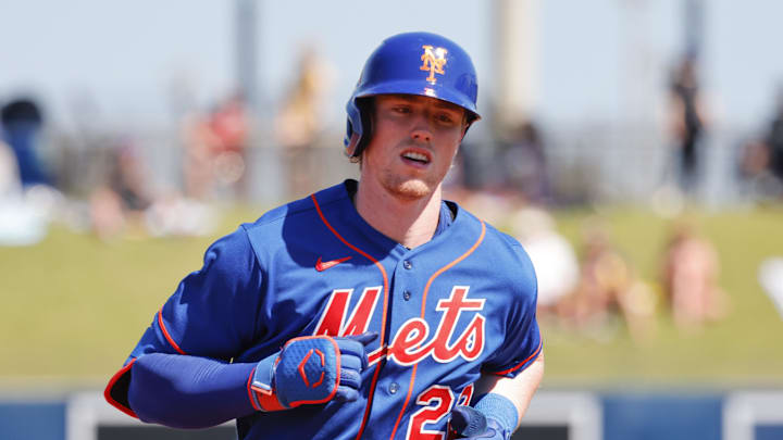 Feb 25, 2023; West Palm Beach, Florida, USA; New York Mets third baseman Brett Baty (22) rounds