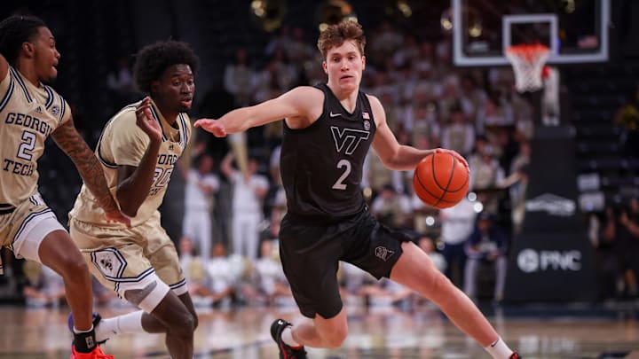 Jan 22, 2025; Atlanta, Georgia, USA; Virginia Tech Hokies guard Jaden Schutt (2) dribbles past Georgia Tech Yellow Jackets forward Ibrahim Souare (30) in the first half at McCamish Pavilion. Mandatory Credit: Brett Davis-Imagn Images Jan 22, 2025; Atlanta, Georgia, USA; Virginia Tech Hokies guard Jaden Schutt (2) dribbles past Georgia Tech Yellow Jackets forward Ibrahim Souare (30) in the first half at McCamish Pavilion. Mandatory Credit: Brett Davis-Imagn Images