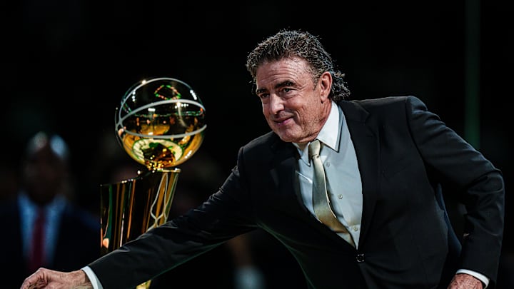 Oct 22, 2024; Boston, Massachusetts, USA; Boston Celtics co-owner Wyc Grousbeckis presents championship rings during the opening night banner raising ceremony before the start of the game against the New York Knicks at TD Garden. Mandatory Credit: David Butler II-Imagn Images