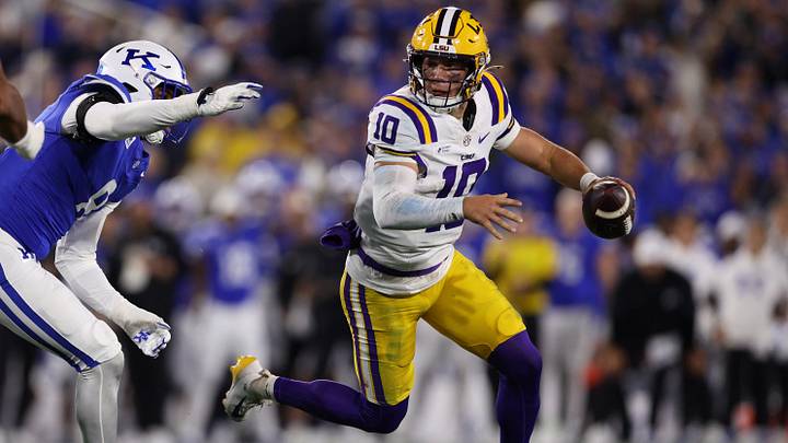 LSU Tigers quarterback Sam Leavitt (10) scrambles against the Kentucky Wildcats during the third quarter at Kroger Field.  