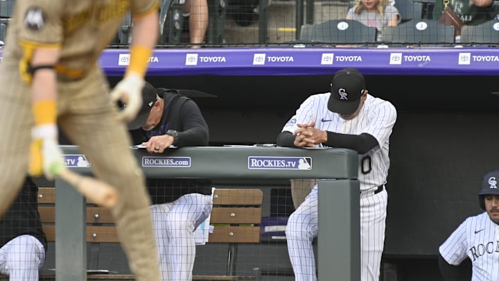 May 10, 2025; Denver, Colorado, USA; Colorado Rockies manager Bud Black (10) stands on the top step of the dugout with his head down during their game against the San Diego Padres at Coors Field. Mandatory Credit: John Leyba-Imagn Images