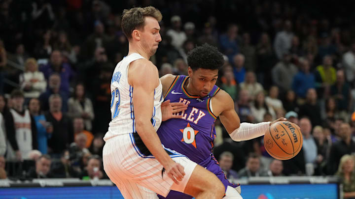 Nov 18, 2024; Phoenix, Arizona, USA; Phoenix Suns forward Ryan Dunn (0) drives on Orlando Magic forward Franz Wagner (22) during the first half of an NBA game at Footprint Center. Mandatory Credit: Rick Scuteri-Imagn Images Nov 18, 2024; Phoenix, Arizona, USA; Phoenix Suns forward Ryan Dunn (0) drives on Orlando Magic forward Franz Wagner (22) during the first half of an NBA game at Footprint Center. Mandatory Credit: Rick Scuteri-Imagn Images