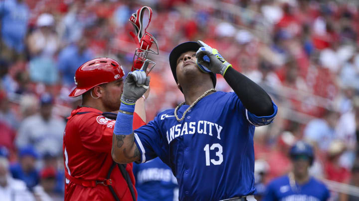 Kansas City Royals catcher Salvador Perez (13) reacts after hitting a solo home run against the St. Louis Cardinals during the sixth inning at Busch Stadium Kansas City Royals catcher Salvador Perez (13) reacts after hitting a solo home run against the St. Louis Cardinals during the sixth inning at Busch Stadium
