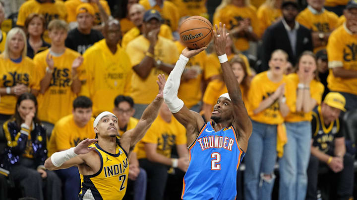 Jun 19, 2025; Indianapolis, Indiana, USA; Oklahoma City Thunder guard Shai Gilgeous-Alexander (2) shoots the ball against Indiana Pacers guard Andrew Nembhard (2) during the first half of game six of the 2025 NBA Finals between the Oklahoma City Thunder and the Indiana Pacers at Gainbridge Fieldhouse. Mandatory Credit: Kyle Terada-Imagn Images