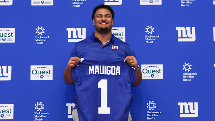 Apr 24, 2026; East Rutherford, NJ, USA; New York Giants draft pick Francis Mauigoa poses for a photo during the introductory press conference at Quest Diagnostics Training Center.