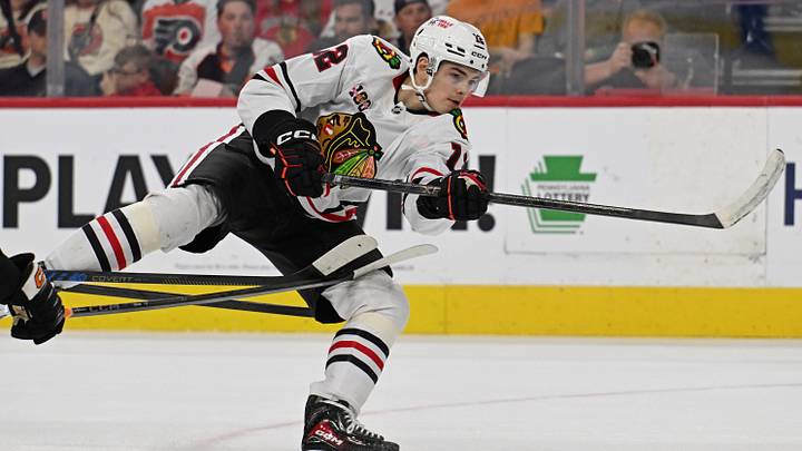 Mar 26, 2026; Philadelphia, Pennsylvania, USA; Chicago Blackhawks center Sacha Boisvert (12) takes a shot on goal against the Philadelphia Flyers during the second period at Xfinity Mobile Arena. Mandatory Credit: Eric Hartline-Imagn Images