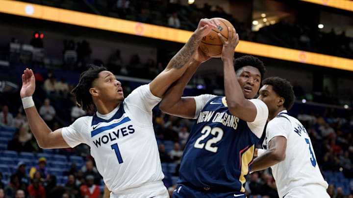 Dec 2, 2025; New Orleans, Louisiana, USA; Minnesota Timberwolves guard/forward Terrence Shannon Jr. (1) and forward Jaden McDaniels (3) defend against New Orleans Pelicans center Derik Queen (22) during the first half at Smoothie King Center. Mandatory Credit: Matthew Hinton-Imagn Images Dec 2, 2025; New Orleans, Louisiana, USA; Minnesota Timberwolves guard/forward Terrence Shannon Jr. (1) and forward Jaden McDaniels (3) defend against New Orleans Pelicans center Derik Queen (22) during the first half at Smoothie King Center. Mandatory Credit: Matthew Hinton-Imagn Images