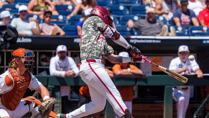 Jun 14, 2026; Omaha, NE, USA; Alabama Crimson Tide designated hitter John Lemm (33) hits a home run against the Texas Longhorns during the fourth inning at Charles Schwab Field. Mandatory Credit: Dylan Widger-Imagn Images Jun 14, 2026; Omaha, NE, USA; Alabama Crimson Tide designated hitter John Lemm (33) hits a home run against the Texas Longhorns during the fourth inning at Charles Schwab Field. Mandatory Credit: Dylan Widger-Imagn Images