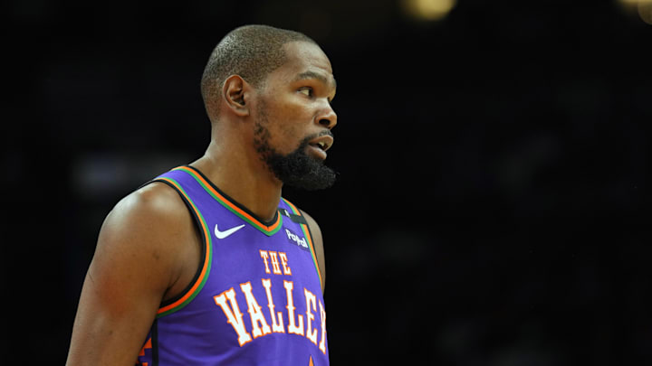 Jan 11, 2025; Phoenix, Arizona, USA; Phoenix Suns forward Kevin Durant (35) looks on against the Utah Jazz during the first half at Footprint Center. Mandatory Credit: Joe Camporeale-Imagn Images