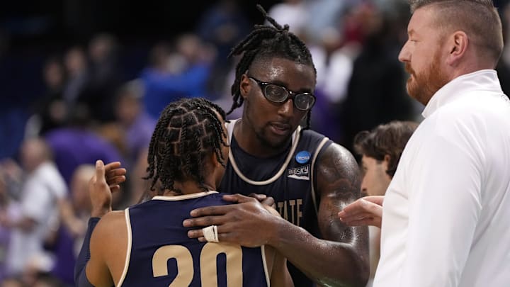 Mar 17, 2023; Greensboro, NC, USA; Montana State Bobcats forward Jubrile Belo (13) and guard Robert