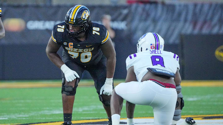 Aug 28, 2025; Columbia, Missouri, USA; Missouri Tigers offensive lineman Cayden Green (70) on the line of scrimmage against the Central Arkansas Bears during the game at Faurot Field at Memorial Stadium. Mandatory Credit: Denny Medley-Imagn Images