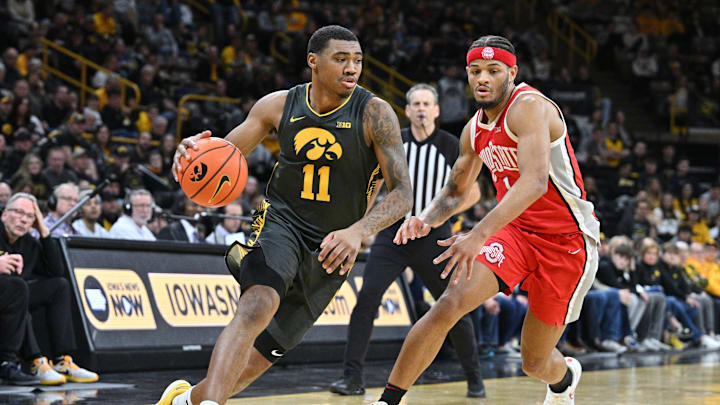 Feb 2, 2024; Iowa City, Iowa, USA; Iowa Hawkeyes guard Tony Perkins (11) goes to the basket as Ohio