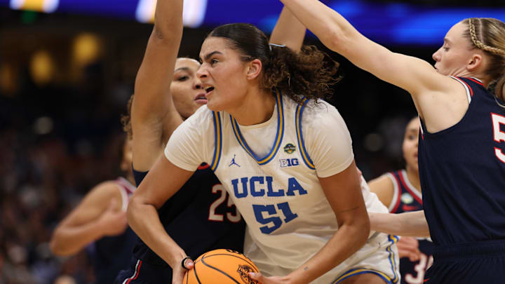 Apr 4, 2025; Tampa, FL, USA; Connecticut Huskies forward Ice Brady (25) defends against UCLA Bruins center Lauren Betts (51) during second quarter in a semifinal of the women's 2025 NCAA tournament at Amalie Arena. Mandatory Credit: Nathan Ray Seebeck-Imagn Images Apr 4, 2025; Tampa, FL, USA; Connecticut Huskies forward Ice Brady (25) defends against UCLA Bruins center Lauren Betts (51) during second quarter in a semifinal of the women's 2025 NCAA tournament at Amalie Arena. Mandatory Credit: Nathan Ray Seebeck-Imagn Images