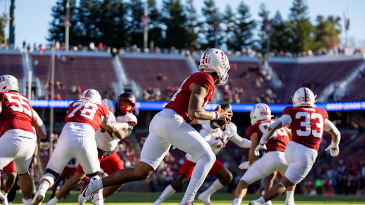 Nov 16, 2024; Stanford, California, USA; Stanford Cardinal quarterback Ashton Daniels (14) scrambles during the third quarter against the Louisville Cardinals at Stanford Stadium. Mandatory Credit: Bob Kupbens-Imagn Images