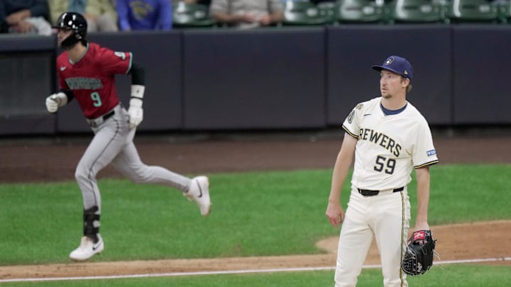Milwaukee Brewers pitcher Erick Fedde (59) watches a two-run home run by Arizona Diamondbacks shortstop Blaze Alexander (9) during the sixth inning of their game Wednesday, August 27, 2025 at American Family Field in Milwaukee, Wisconsin. Milwaukee Brewers pitcher Erick Fedde (59) watches a two-run home run by Arizona Diamondbacks shortstop Blaze Alexander (9) during the sixth inning of their game Wednesday, August 27, 2025 at American Family Field in Milwaukee, Wisconsin.