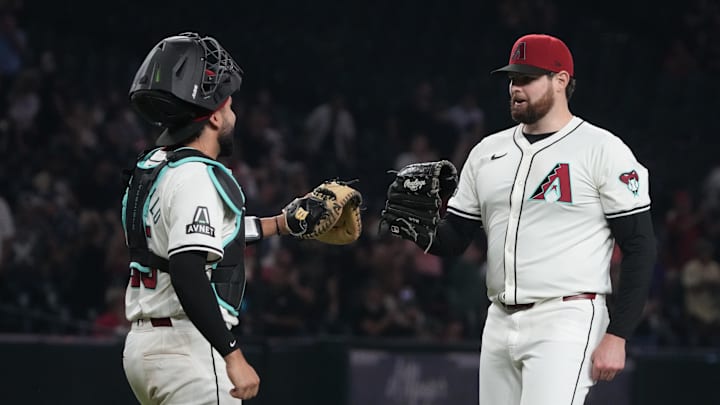 Sep 11, 2024; Phoenix, Arizona, USA; Arizona Diamondbacks catcher Adrian Del Castillo (25) and pitcher Jordan Montgomery (52) celebrate after defeating the Texas Rangers at Chase Field. Mandatory Credit: Rick Scuteri-Imagn Images