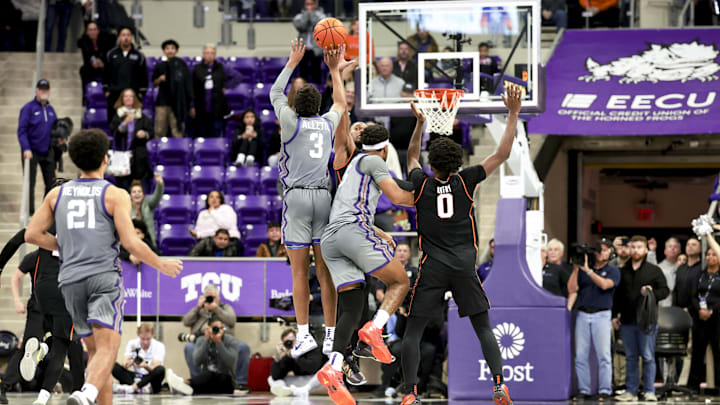 Feb 12, 2025; Fort Worth, Texas, USA; TCU Horned Frogs guard Vasean Allette (3) hits the game-winning shot during the second half against the Oklahoma State Cowboys at Ed and Rae Schollmaier Arena. Mandatory Credit: Kevin Jairaj-Imagn Images
