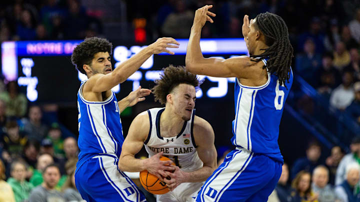 Feb 24, 2026; South Bend, Indiana, USA; Duke Blue Devils guard Cayden Boozer (2) and forward Maliq Brown (6) defend Notre Dame Fighting Irish guard Braeden Shrewsberry (11) during the first half at Purcell Pavilion at the Joyce Center. Feb 24, 2026; South Bend, Indiana, USA; Duke Blue Devils guard Cayden Boozer (2) and forward Maliq Brown (6) defend Notre Dame Fighting Irish guard Braeden Shrewsberry (11) during the first half at Purcell Pavilion at the Joyce Center.