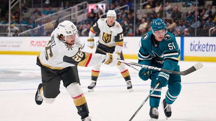 Sep 21, 2025; San Jose, California, USA; Vegas Golden Knights right wing Alexander Holtz (26) shoots the puck against San Jose Sharks right wing Collin Graf (51) and goaltender Alex Nedeljkovic (33) (not pictured) during the third period at SAP Center at San Jose. Mandatory Credit: Robert Edwards-Imagn Images Sep 21, 2025; San Jose, California, USA; Vegas Golden Knights right wing Alexander Holtz (26) shoots the puck against San Jose Sharks right wing Collin Graf (51) and goaltender Alex Nedeljkovic (33) (not pictured) during the third period at SAP Center at San Jose. Mandatory Credit: Robert Edwards-Imagn Images
